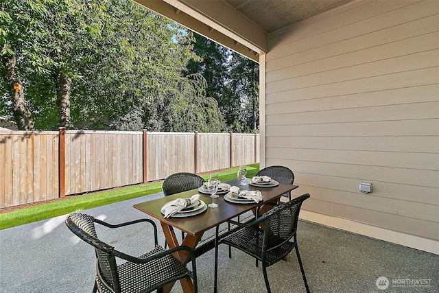 7391 Mirasett St SW Lot 42, Tumwater, WA 98512 - fenced backyard with a patio and outdoor dining space