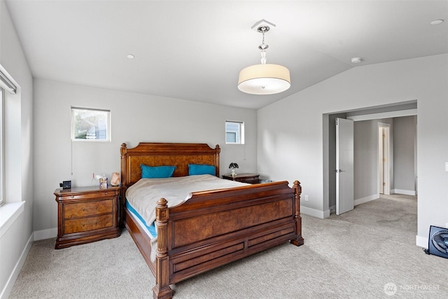 13695 NE 100th Ct, Kirkland, WA 98033 - bedroom with light carpet, vaulted ceiling, and baseboards