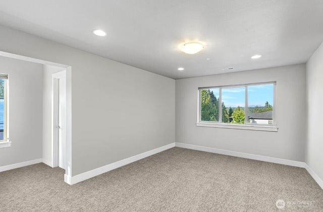 13695 NE 100th Ct, Kirkland, WA 98033 - carpeted empty room featuring baseboards and recessed lighting