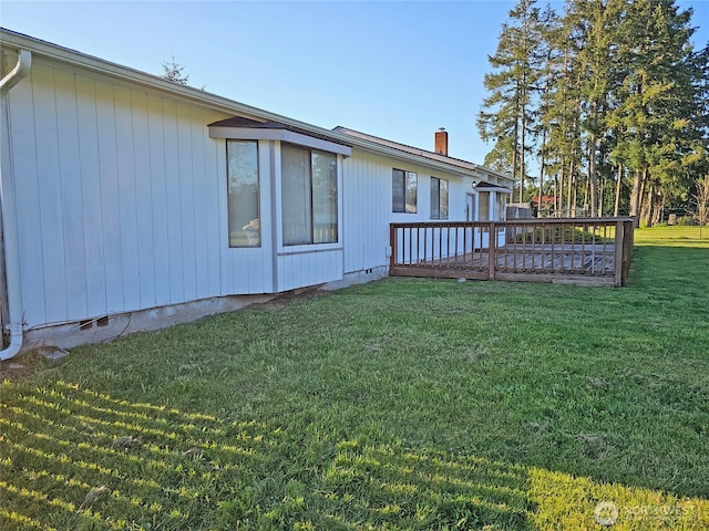 20025 Carper Rd SW, Rochester, WA 98579 - view of property exterior with a yard, crawl space, a chimney, and a deck