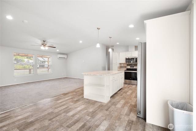 133 Broad St W, Bremerton, WA 98312 - kitchen with appliances with stainless steel finishes, open shelves, white cabinets, a wall mounted air conditioner, and recessed lighting