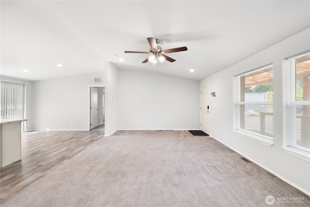 133 Broad St W, Bremerton, WA 98312 - unfurnished room featuring light colored carpet, ceiling fan, vaulted ceiling, and recessed lighting