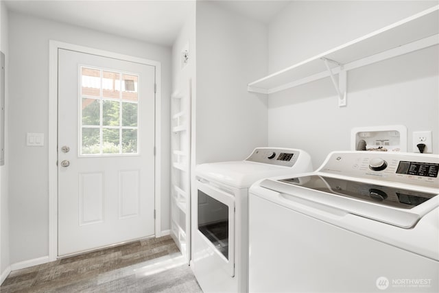 133 Broad St W, Bremerton, WA 98312 - laundry room with washing machine and clothes dryer and wood finished floors