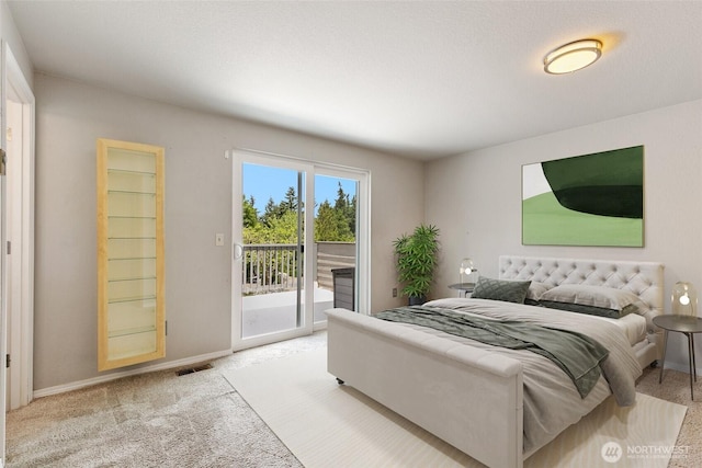 10008 50th Pl W, Mukilteo, WA 98275 - bedroom with access to outside and light carpet