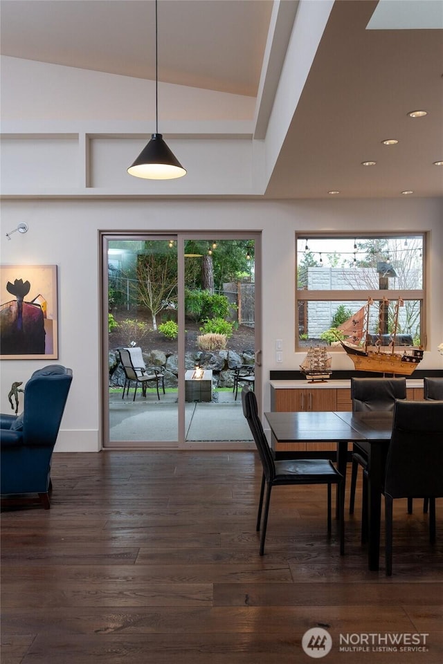11116 SE 4th St, Bellevue, WA 98004 - dining space featuring dark wood finished floors, recessed lighting, healthy amount of natural light, and lofted ceiling