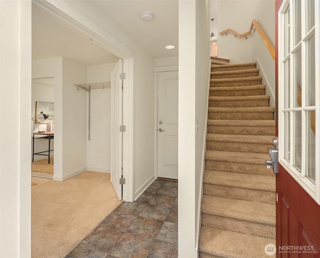 7321 47th Ave SW Unit B, Seattle, WA 98136 - staircase featuring carpet flooring, baseboards, and stone finish floors