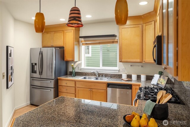7321 47th Ave SW Unit B, Seattle, WA 98136 - kitchen with appliances with stainless steel finishes, a sink, tile counters, light brown cabinetry, and light wood-type flooring