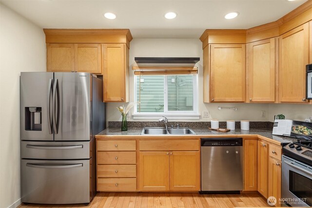 7321 47th Ave SW Unit B, Seattle, WA 98136 - kitchen featuring appliances with stainless steel finishes, a sink, light wood-style floors, recessed lighting, and light brown cabinets
