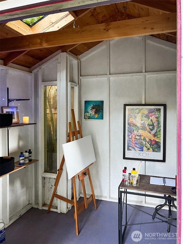 7321 47th Ave SW Unit B, Seattle, WA 98136 - office area with vaulted ceiling, concrete flooring, and a skylight