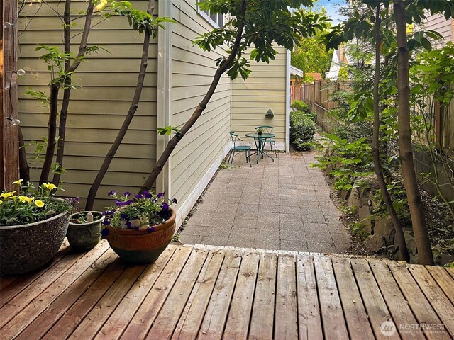 7321 47th Ave SW Unit B, Seattle, WA 98136 - wooden deck with a patio area