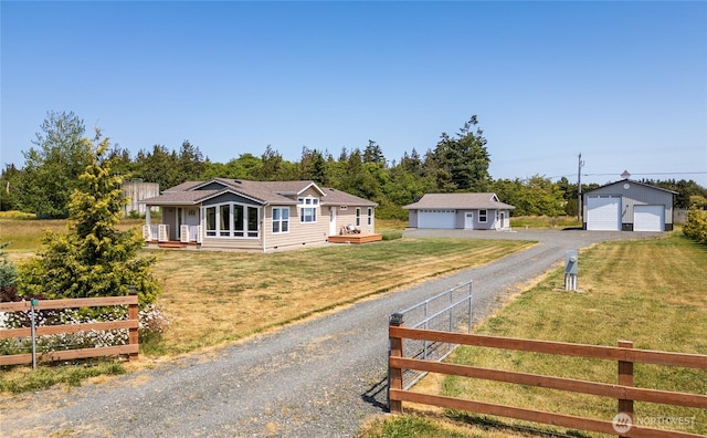 155 Triopha Ln, Sequim, WA 98382 - ranch-style home with a garage, an outdoor structure, and crawl space