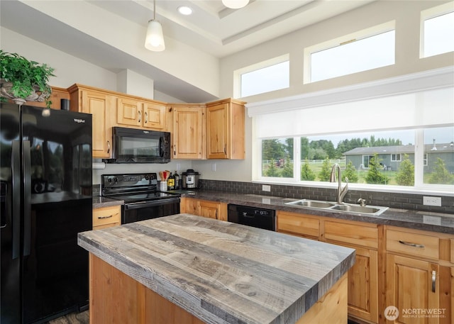 155 Triopha Ln, Sequim, WA 98382 - kitchen featuring black appliances, a center island, light brown cabinetry, and hanging light fixtures