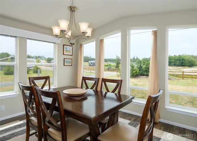 155 Triopha Ln, Sequim, WA 98382 - dining area with a chandelier and wood finished floors