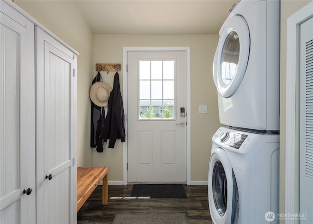 155 Triopha Ln, Sequim, WA 98382 - laundry room with stacked washing machine and dryer and dark wood finished floors