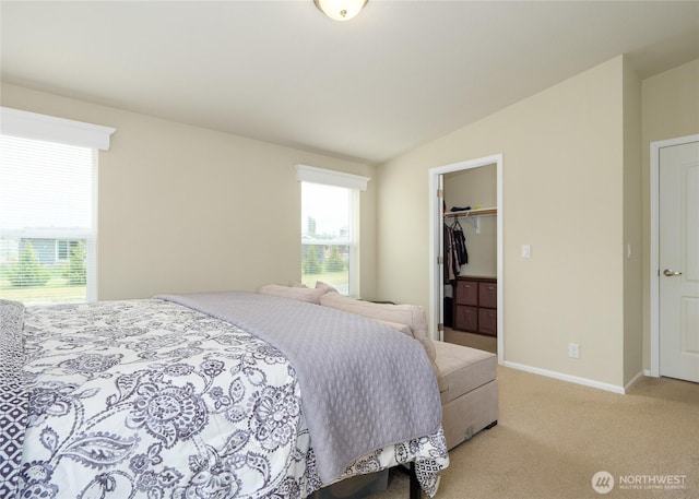 155 Triopha Ln, Sequim, WA 98382 - bedroom featuring vaulted ceiling, carpet, a walk in closet, and a closet
