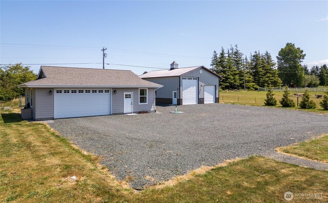 155 Triopha Ln, Sequim, WA 98382 - view of front of house featuring a garage and an outdoor structure