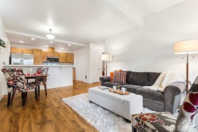 5907 40th Ave SW Unit B, Seattle, WA 98136 - living room with beam ceiling, recessed lighting, wood finished floors, and baseboards
