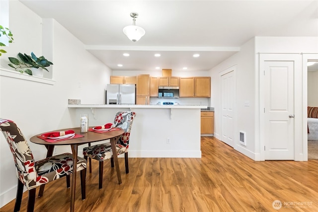 5907 40th Ave SW Unit B, Seattle, WA 98136 - dining space featuring light wood-style floors, recessed lighting, and baseboards