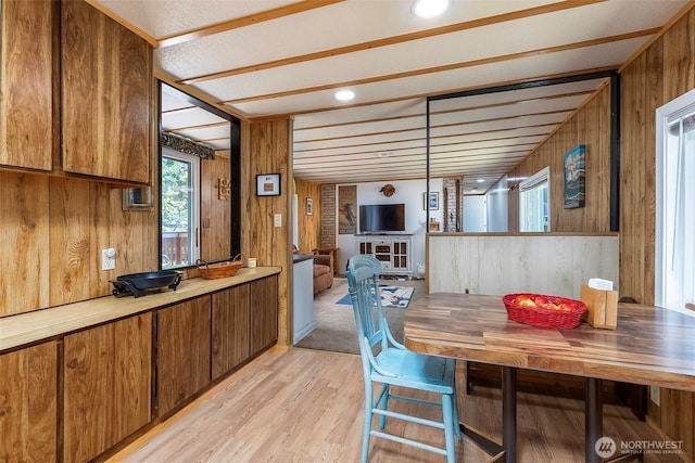 118 Silver Tip Ln, Packwood, WA 98361 - dining room with light wood-style floors and wood walls