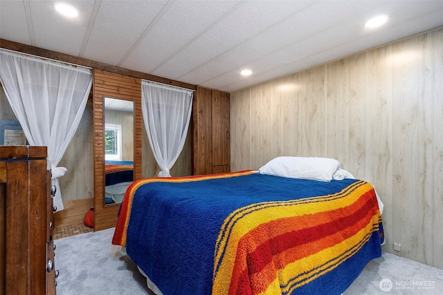 118 Silver Tip Ln, Packwood, WA 98361 - bedroom with wood walls and carpet flooring