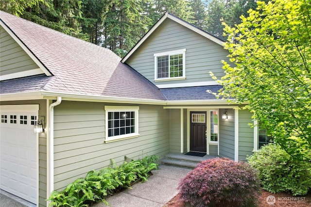 7302 Phillips Rd SE, Port Orchard, WA 98367 - view of front of house featuring roof with shingles and an attached garage