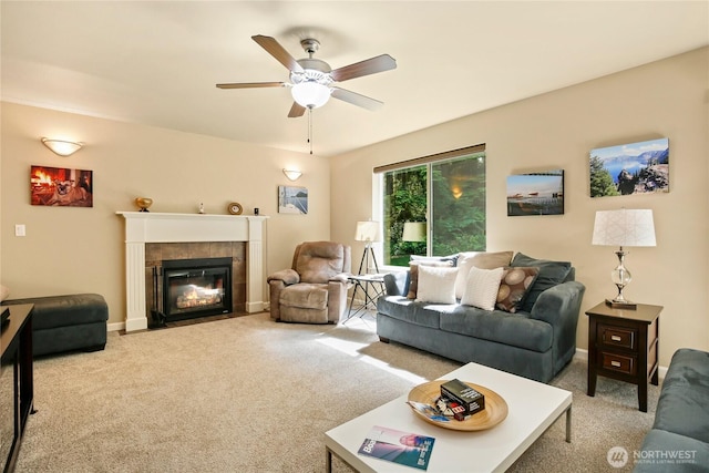 7302 Phillips Rd SE, Port Orchard, WA 98367 - carpeted living area with a ceiling fan and a tiled fireplace