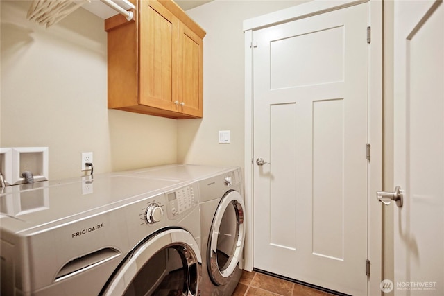 7302 Phillips Rd SE, Port Orchard, WA 98367 - washroom featuring cabinet space and washer and dryer