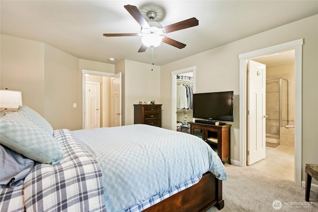 7302 Phillips Rd SE, Port Orchard, WA 98367 - bedroom with light colored carpet, baseboards, ceiling fan, a closet, and a spacious closet