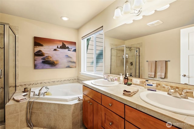 7302 Phillips Rd SE, Port Orchard, WA 98367 - bathroom featuring a shower stall, a bath, and double vanity