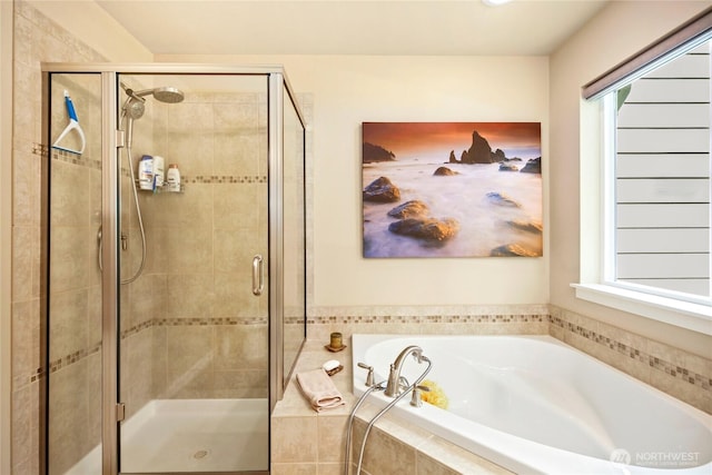 7302 Phillips Rd SE, Port Orchard, WA 98367 - bathroom featuring a bath, a shower stall, and healthy amount of natural light