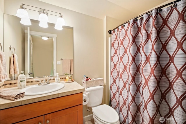 7302 Phillips Rd SE, Port Orchard, WA 98367 - bathroom featuring vanity, toilet, and a shower with shower curtain