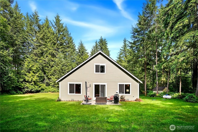 7302 Phillips Rd SE, Port Orchard, WA 98367 - back of property with a yard and a patio area