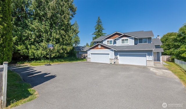 2715 99th Ave NE, Lake Stevens, WA 98258 - view of front of house with driveway and roof with shingles