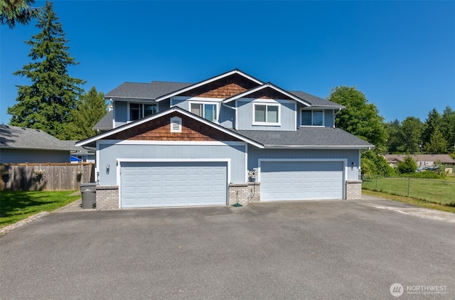 2715 99th Ave NE, Lake Stevens, WA 98258 - craftsman-style house with asphalt driveway and brick siding