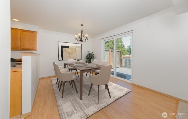 2715 99th Ave NE, Lake Stevens, WA 98258 - dining area featuring light wood finished floors and a chandelier