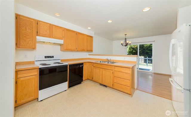 2715 99th Ave NE, Lake Stevens, WA 98258 - kitchen featuring white appliances, under cabinet range hood, light floors, a peninsula, and light countertops