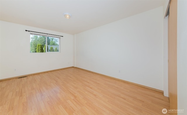 2715 99th Ave NE, Lake Stevens, WA 98258 - unfurnished room featuring light wood-type flooring and baseboards