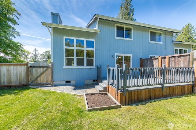 2715 99th Ave NE, Lake Stevens, WA 98258 - back of property featuring a gate, a wooden deck, and crawl space
