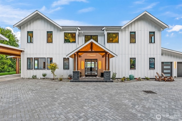 9418 165th Avenue Ct SW, Longbranch, WA 98351 - modern farmhouse featuring board and batten siding, french doors, and a garage