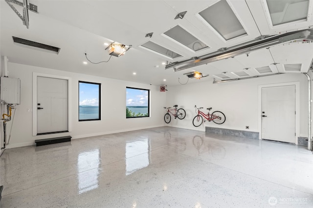 9418 165th Avenue Ct SW, Longbranch, WA 98351 - garage featuring a garage door opener and recessed lighting