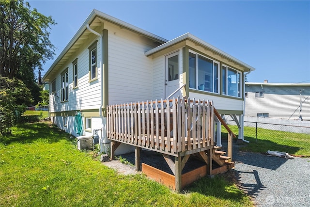1612 7th St, Anacortes, WA 98221 - back of house with a deck and a sunroom