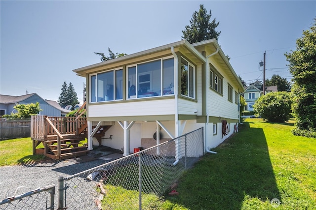 1612 7th St, Anacortes, WA 98221 - view of front of property with a sunroom and stairway