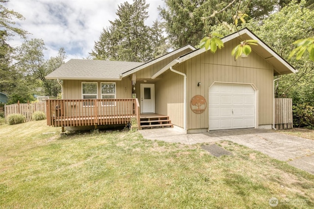 401 Draconis Ave SE, Ocean Shores, WA 98569 - view of front of home featuring driveway, a deck, a garage, and roof with shingles