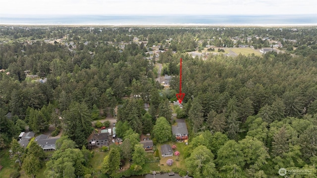 401 Draconis Ave SE, Ocean Shores, WA 98569 - view of property location with a heavily wooded area