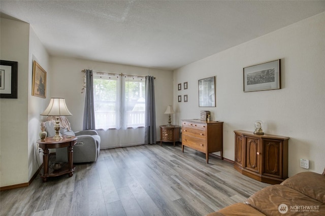 401 Draconis Ave SE, Ocean Shores, WA 98569 - sitting room featuring light wood finished floors and baseboards