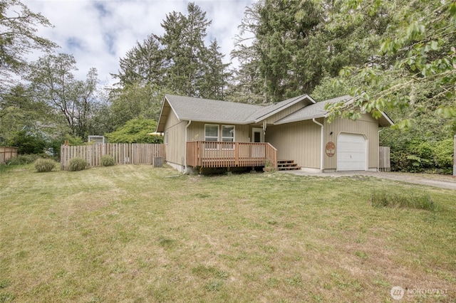 401 Draconis Ave SE, Ocean Shores, WA 98569 - single story home featuring an attached garage, dirt driveway, and a wooden deck
