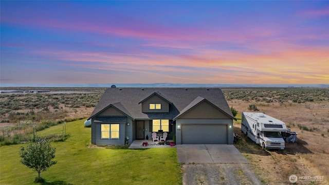 7186 16th Rd NE, Moses Lake, WA 98837 - view of front of property with driveway and an attached garage