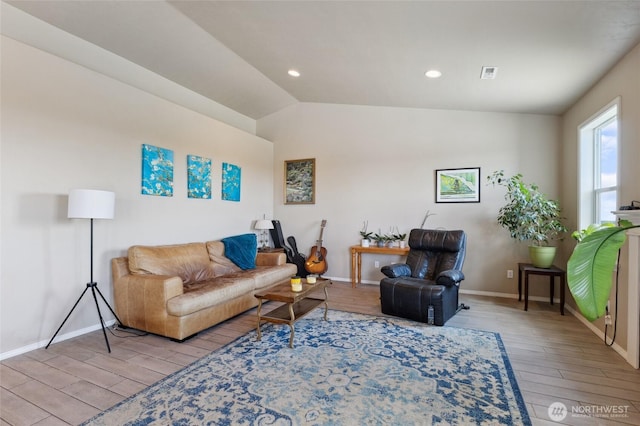 7186 16th Rd NE, Moses Lake, WA 98837 - living room with wood finished floors, baseboards, lofted ceiling, and recessed lighting