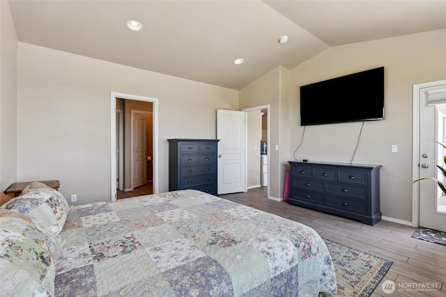 7186 16th Rd NE, Moses Lake, WA 98837 - bedroom featuring lofted ceiling, wood finished floors, and baseboards