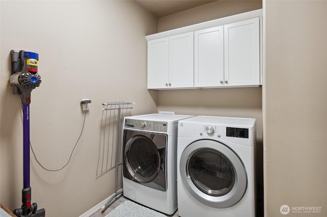 7186 16th Rd NE, Moses Lake, WA 98837 - laundry area featuring washer and clothes dryer, cabinet space, and baseboards